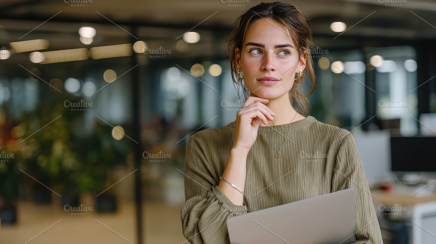 Thoughtful businesswoman holding lap, a Photo by Pixeness Studio