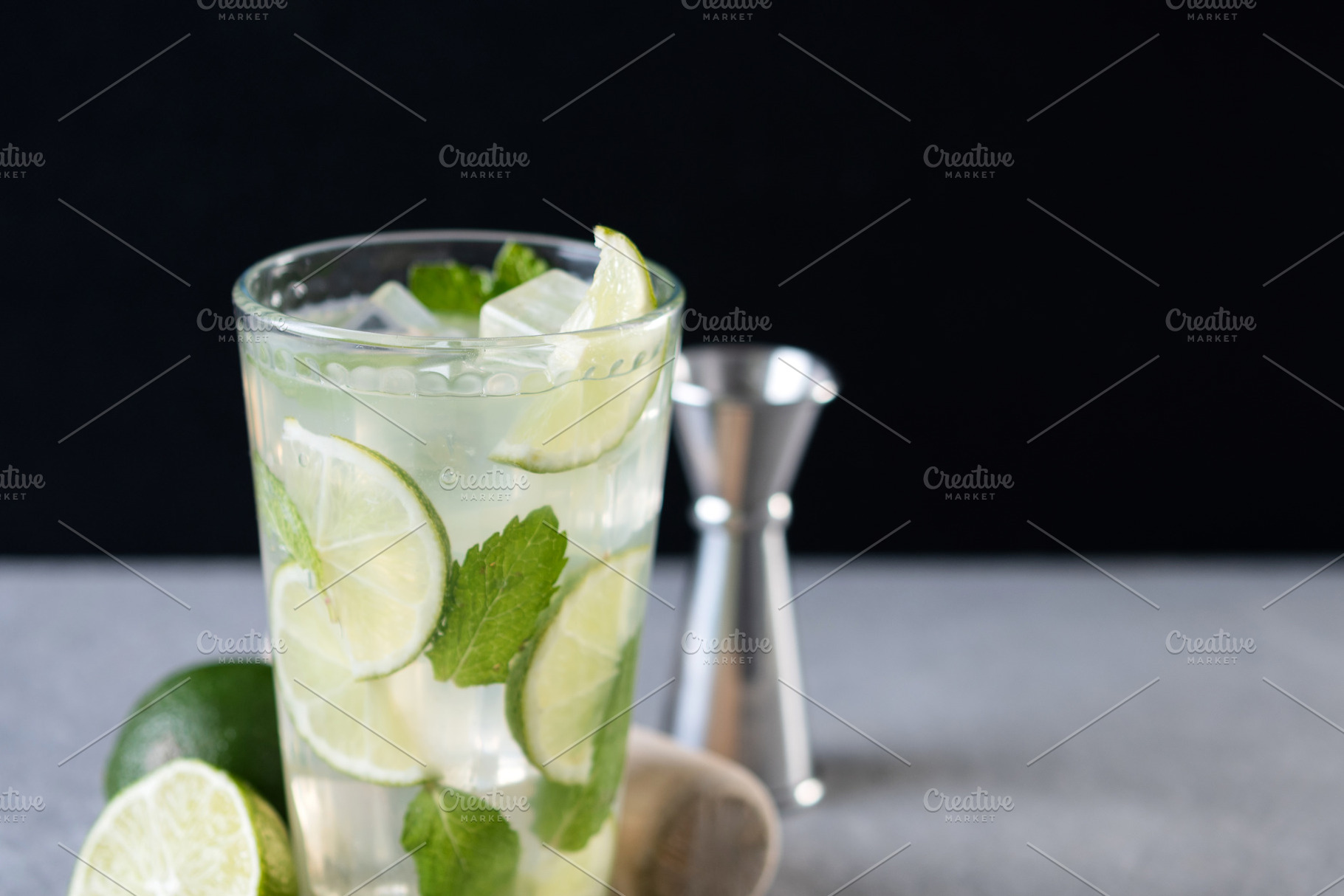 Fresh mojito cocktail with lime, mint and ice in glass, a Food & Drink Photo by etorres69