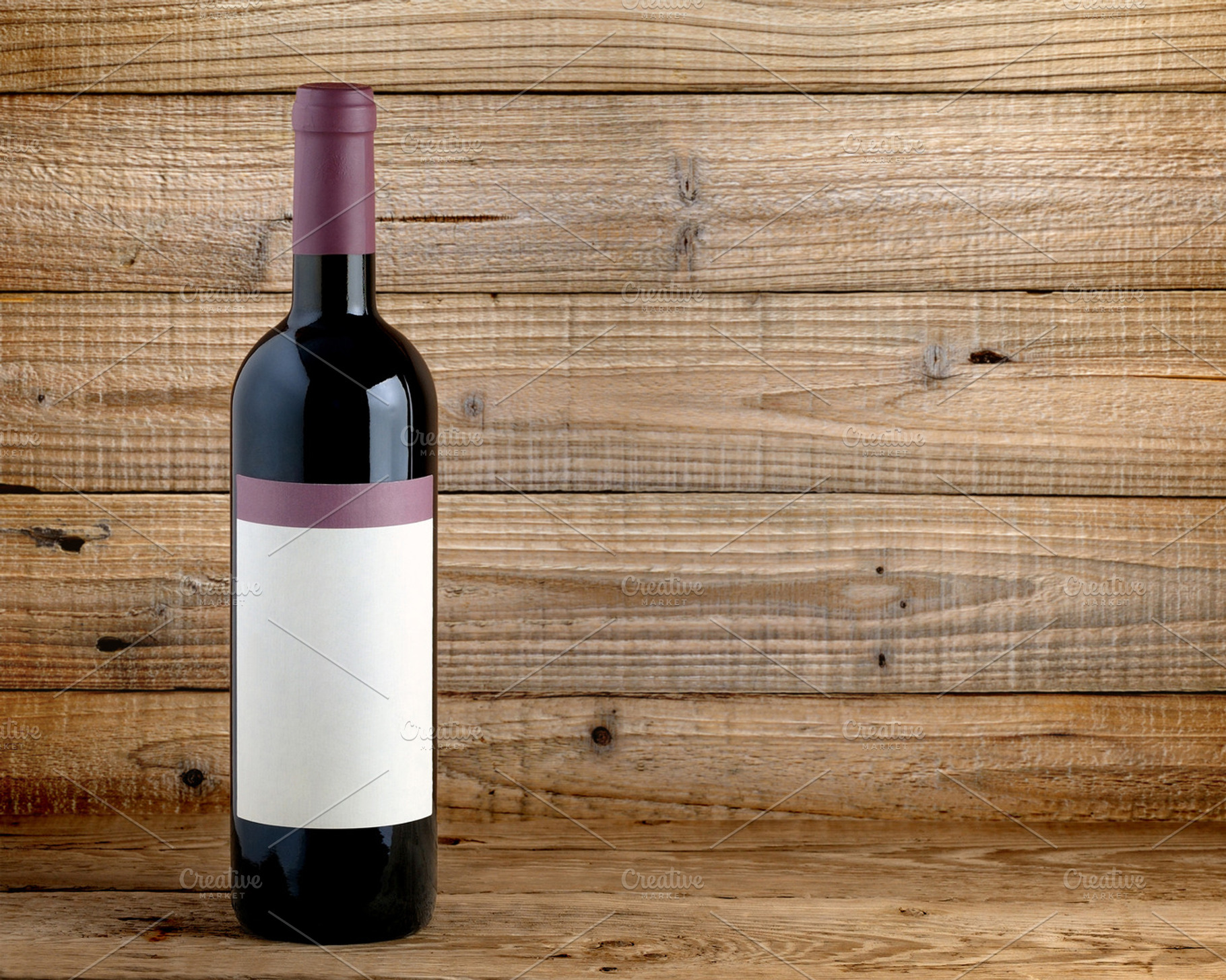 Wine bottle containing wine, bottle, and red