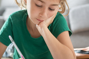 Elementary School Girl Writing Homework, a Person Photo by etorres69