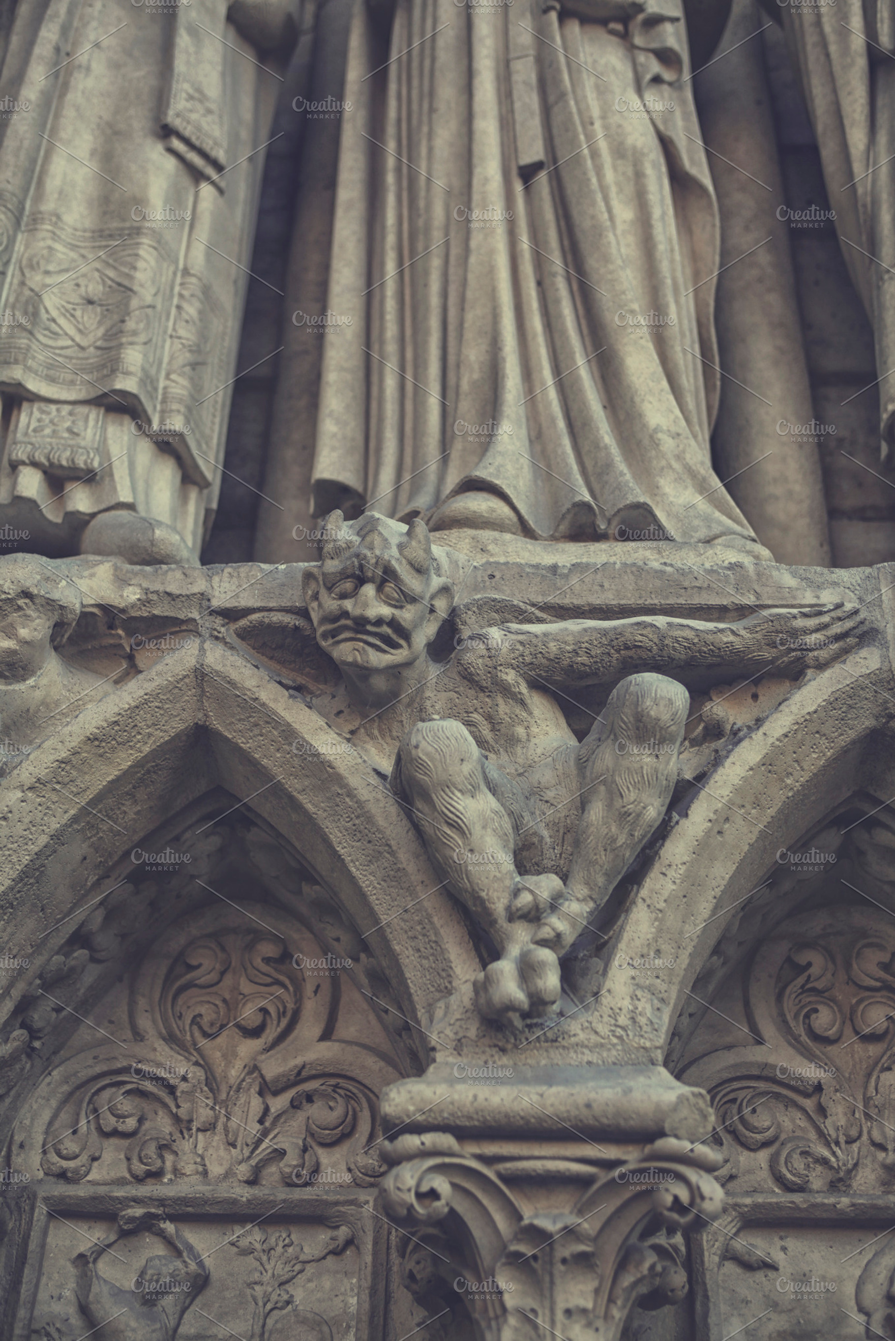 Bored gargoyle, an Architecture Photo by Patricia Hofmeester