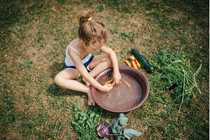 Little girl washing freshly, a Food & Drink Photo by HalfPoint