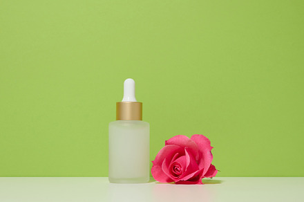 White glass bottle with pipette for cosmetics, oils and serum. A, a Beauty & Fashion Photo by ndanko