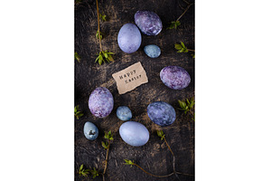 Festive Easter eggs in purple and, a Holiday Photo by Yulia Furman