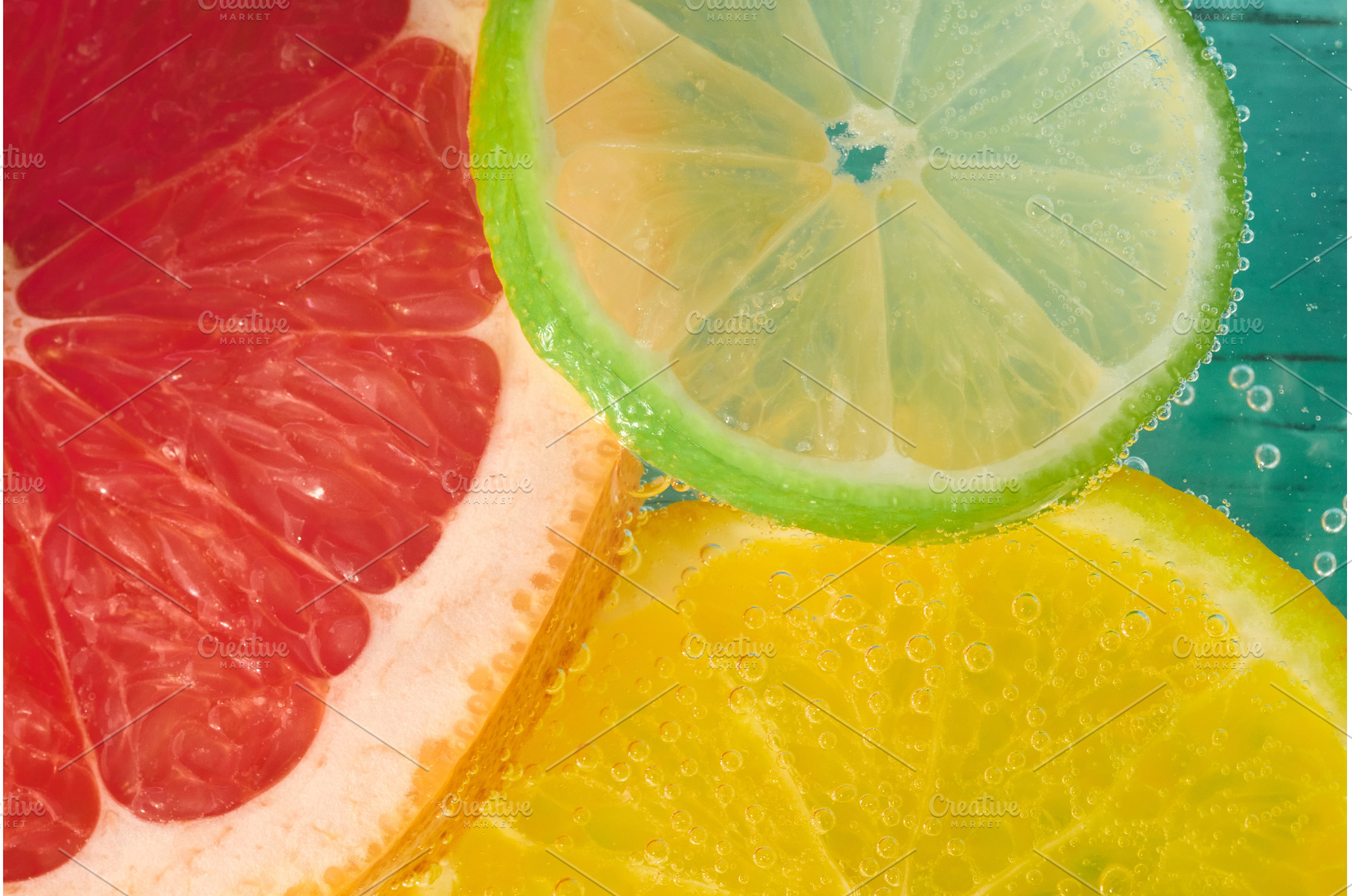 Slices of grapefruit, lemon, and, a Food & Drink Photo by darksoul72
