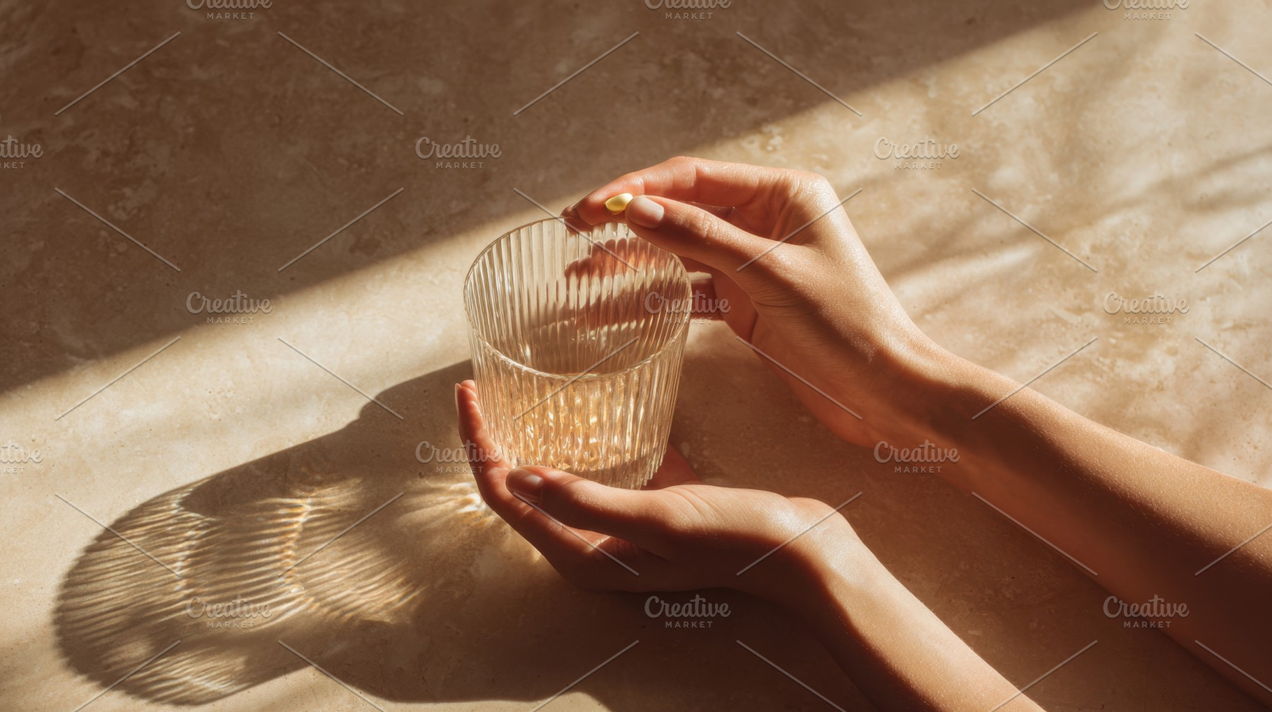 Hands holding a glass of drink, a Photo by Beautiful things
