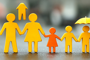 Family representation with paper cutout figures showcasing security and care, a Photo by AS photostudio