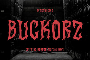Buckorz Dripping Horror Display Font, a Handwritten Font by Maulana Creative