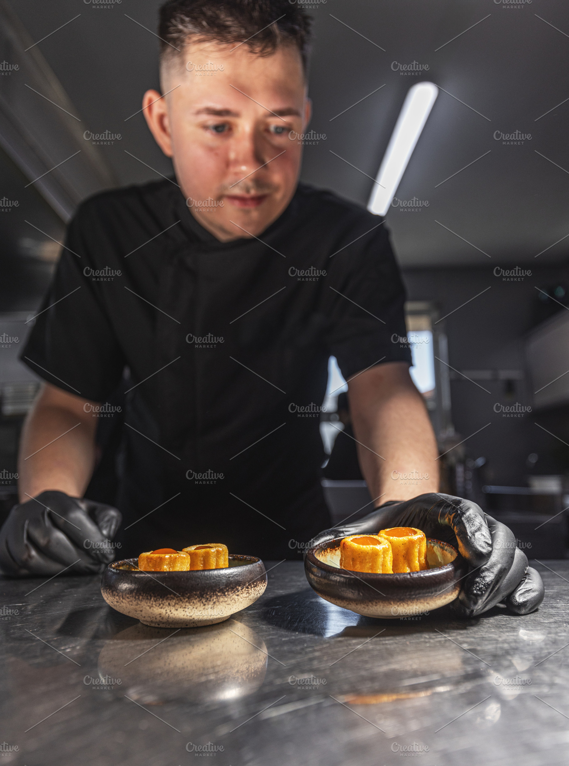 Professional chef plating elegant appetizers, a Photo by Grafvision photography