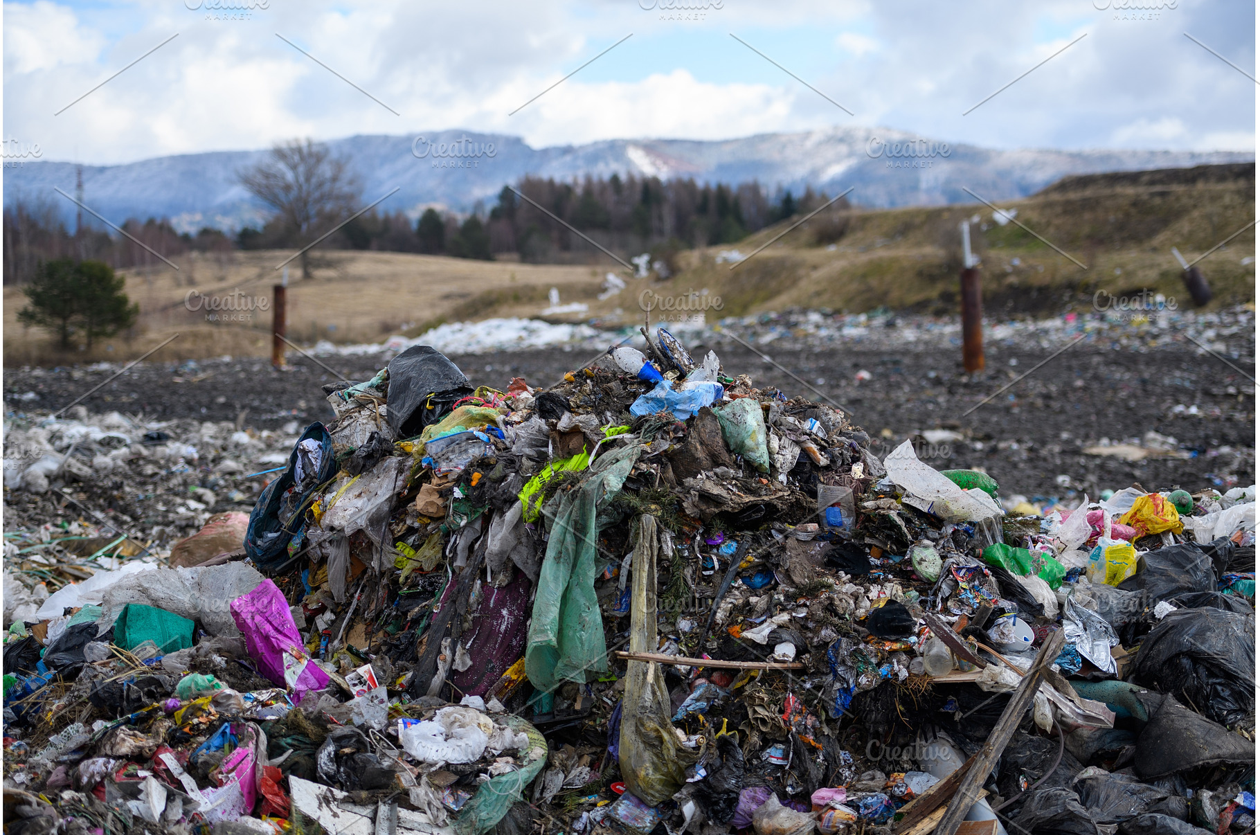 Landfill, large pile of waste, a Person Photo by HalfPoint