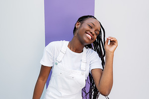Young female with braids having fun, a Person Photo by Artem Varnitsin