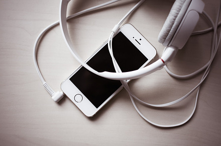 Iphone With Headphones Detail Containing Iphone Desk And Headphones preview 3