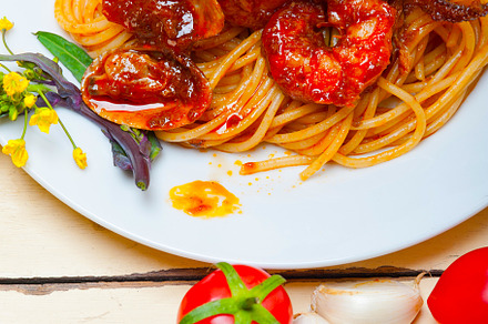Italian seafood spaghetti pasta on red tomato sauce, a Food & Drink Photo by keko64