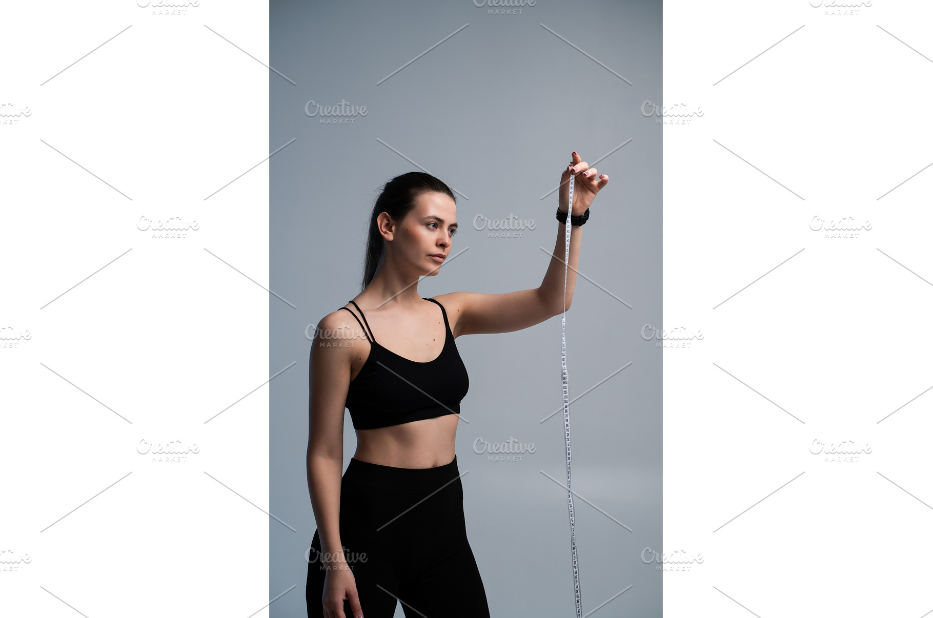 Woman measuring body progress, a Sports & Recreation Photo by volodymyrshtun13795