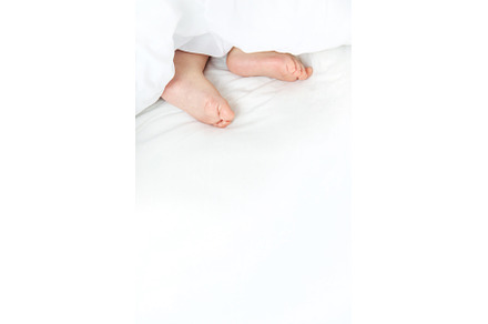 Baby sleeps on a white bed with his, a Person Photo by yanadjana