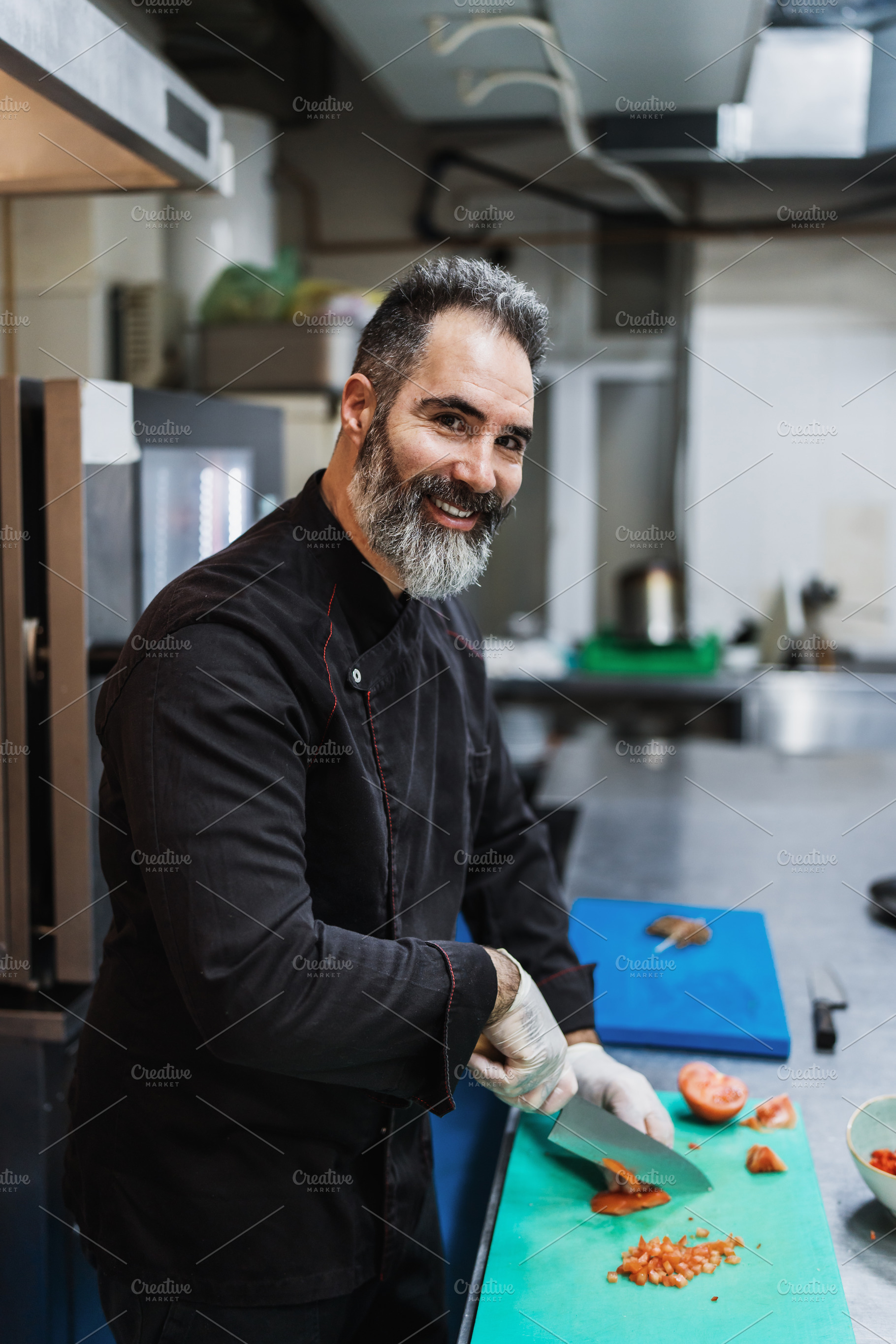 Professional chef preparing food, a Person Photo by REDDOT Studio
