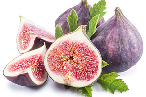 Ripe fig fruits on the white background.