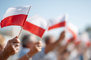 People holding Polish flags during, a Person Photo by MistyDay