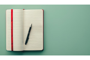 Open lined notebook with pen on, a School & Education Photo by piter.goskov