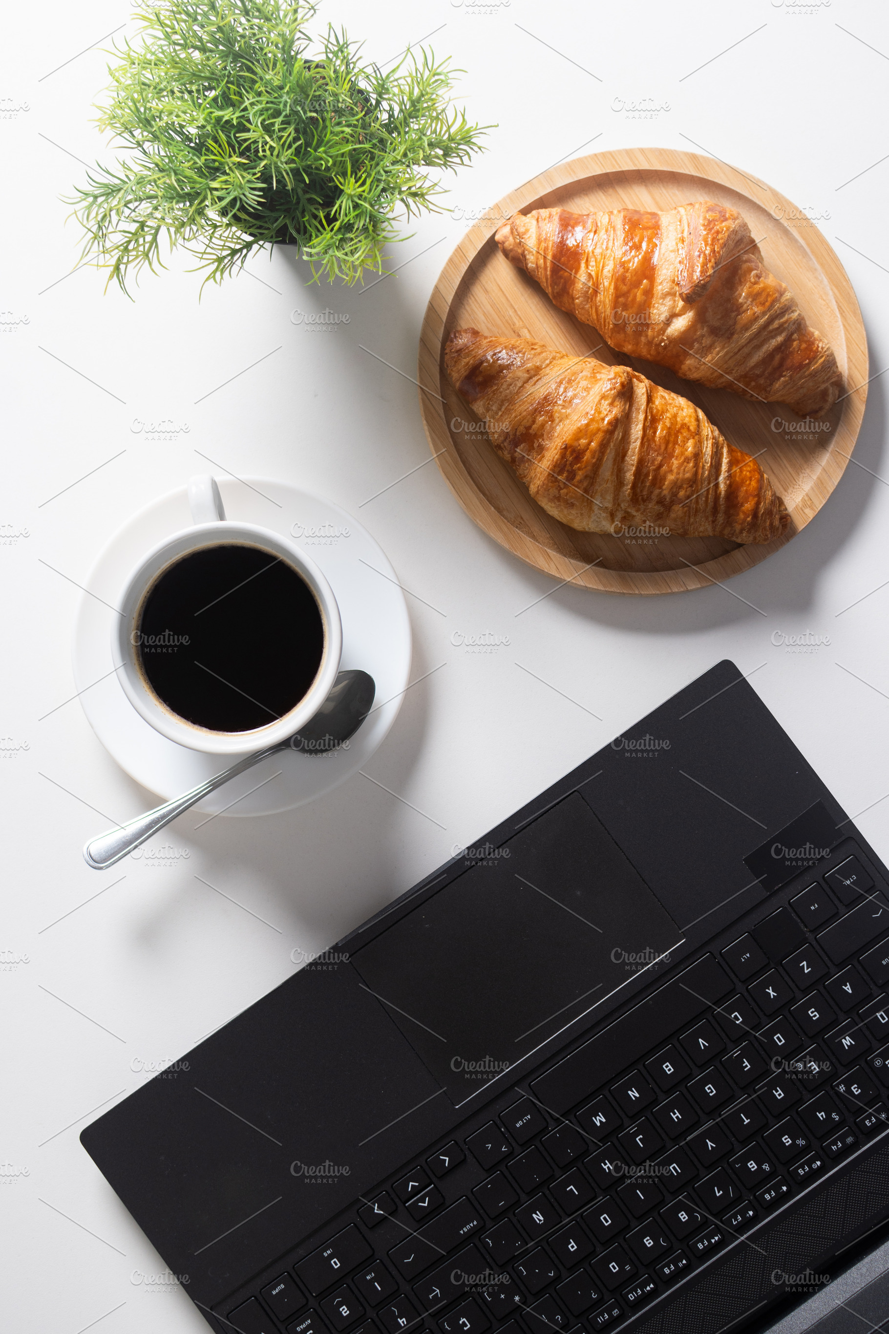 Breakfast with Coffee and Croissants on Home Office Desk, a Food & Drink Photo by etorres69