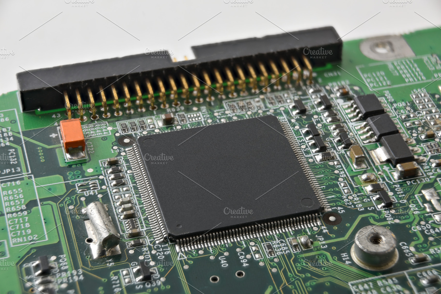 Embedded Microcontroller on Green PCB, a Technology Photo by Davizro's Market