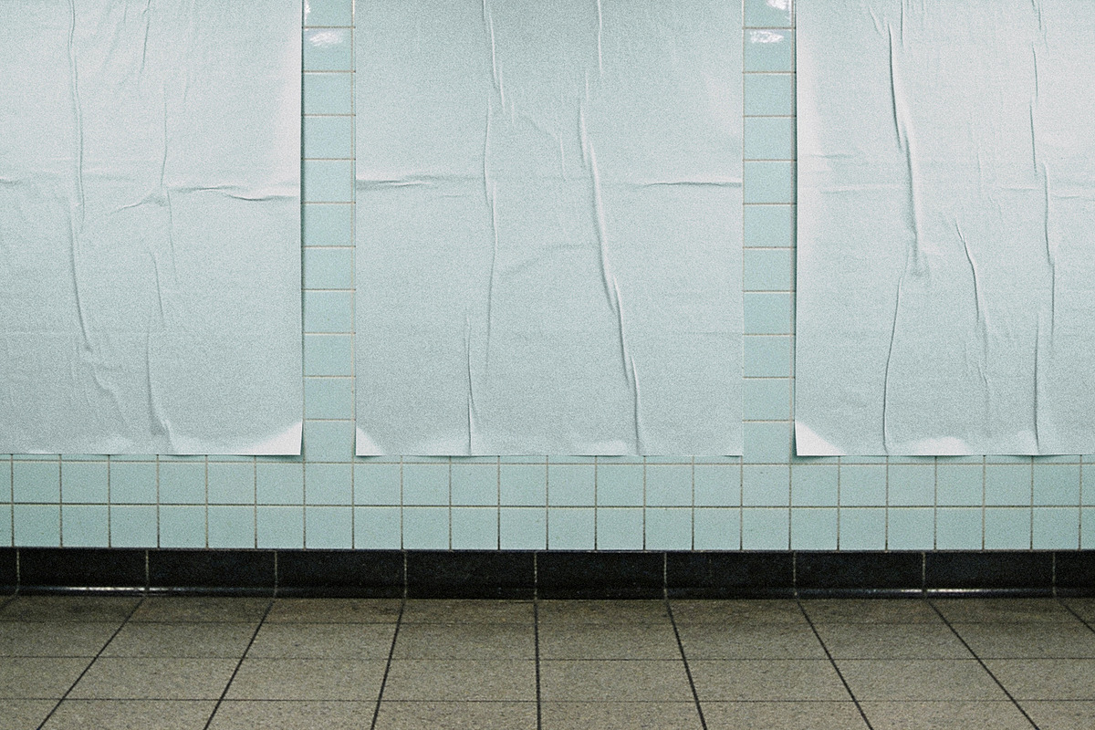Glued Posters Mockup on Tile Wall, an Advertising Mockup by Design Squad (Photo 2 of 5)
