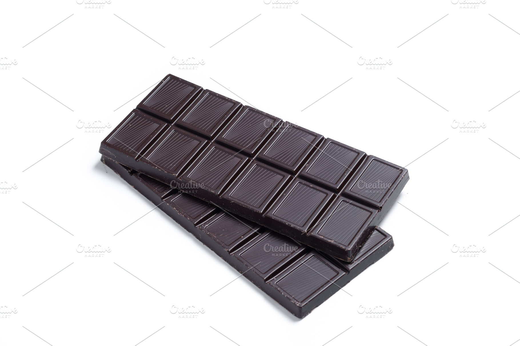 Dark chocolate barted on white background, a Food & Drink Photo by etorres69