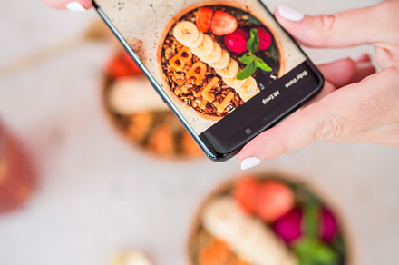 Female hands taking a photo