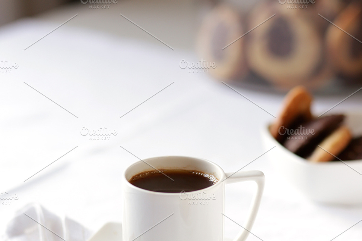 Coffee in white 4, a Cups & Container Mockup by the studio louvain shop (Photo 2 of 2)