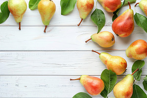 Red pears with leafs and copyspace for text on wooden table, a Food & Drink Photo by AlyaAnd