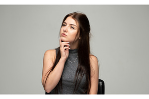 Young woman thinking, contemplating, a Person Photo by volodymyrshtun13795