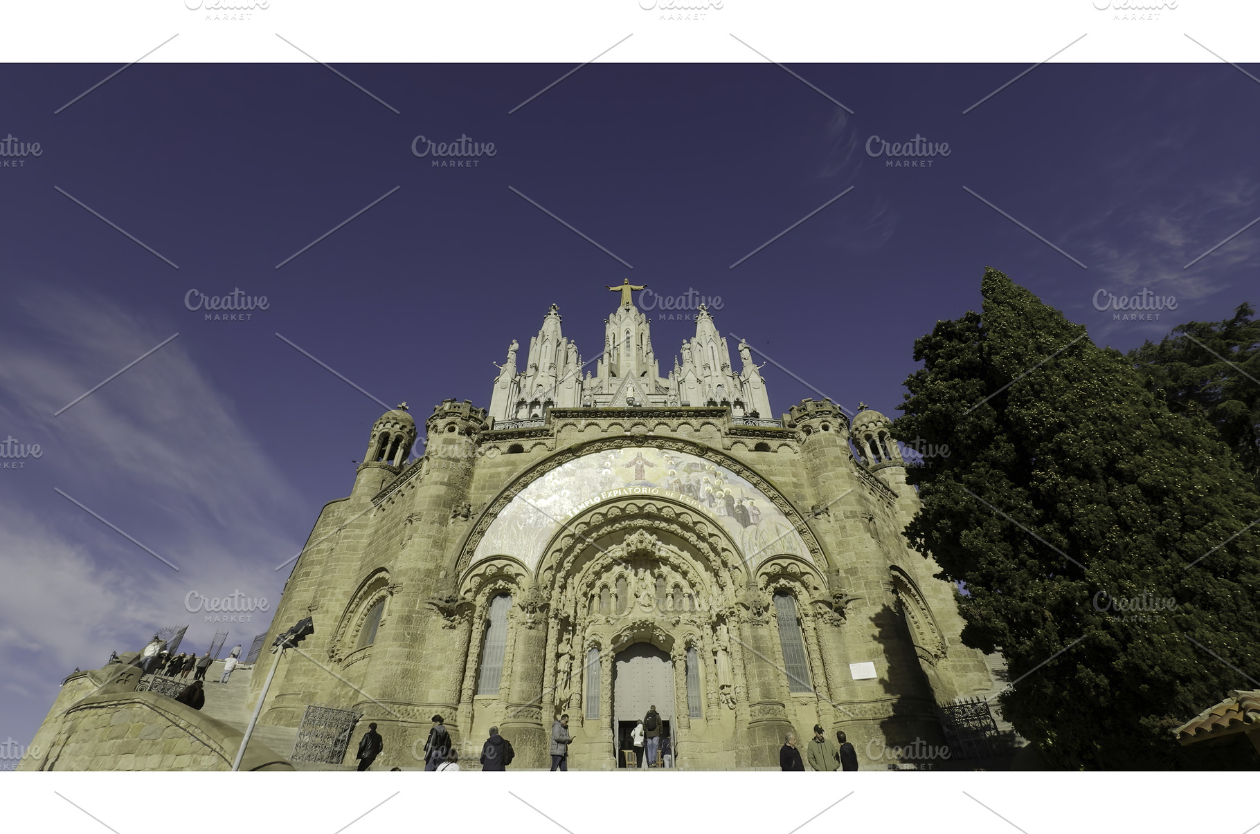 Tourists visiting tibidabo church in, an Architecture Photo by Media Whale Stock
