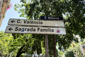 Directional street signs to Sagrada Família and Carrer Valènci, a Photo by AS photostudio