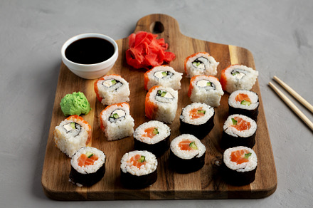 Homemade Sushi Platter with Wasabi and Soy Sauce on a Board, sid, a Food & Drink Photo by LiudmylaChuhunova