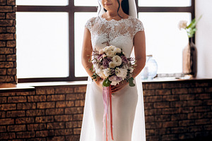 portrait of a young bride inside a restaurant agains, a Person Photo by Weddings, People, Travel