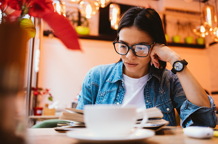 Beautiful young brunette woman wearing casual outfit and glasses, a Person Photo by progressman