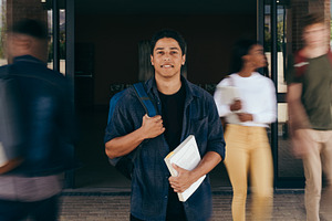 Male student at college campus, a School & Education Photo by Jacob Lund