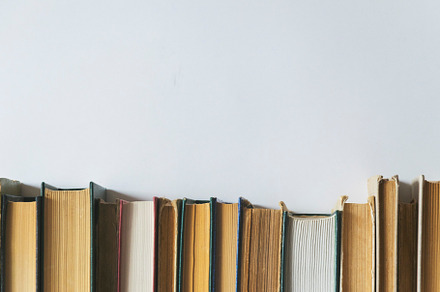 Old books on a white background, a School & Education Photo by Ti-Di