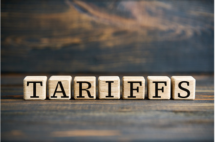Word TARIFFS on wooden blocks over