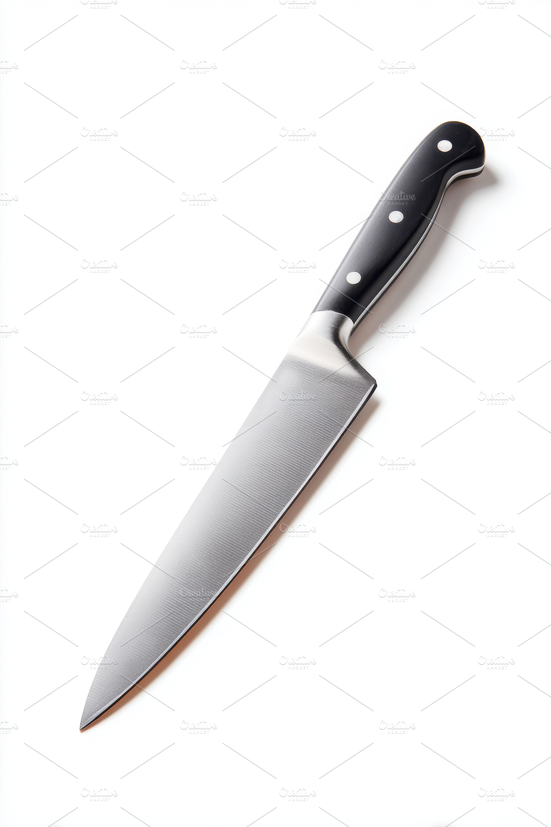 Sleek modern kitchen knife on white background, a Food & Drink Photo by AlyaAnd