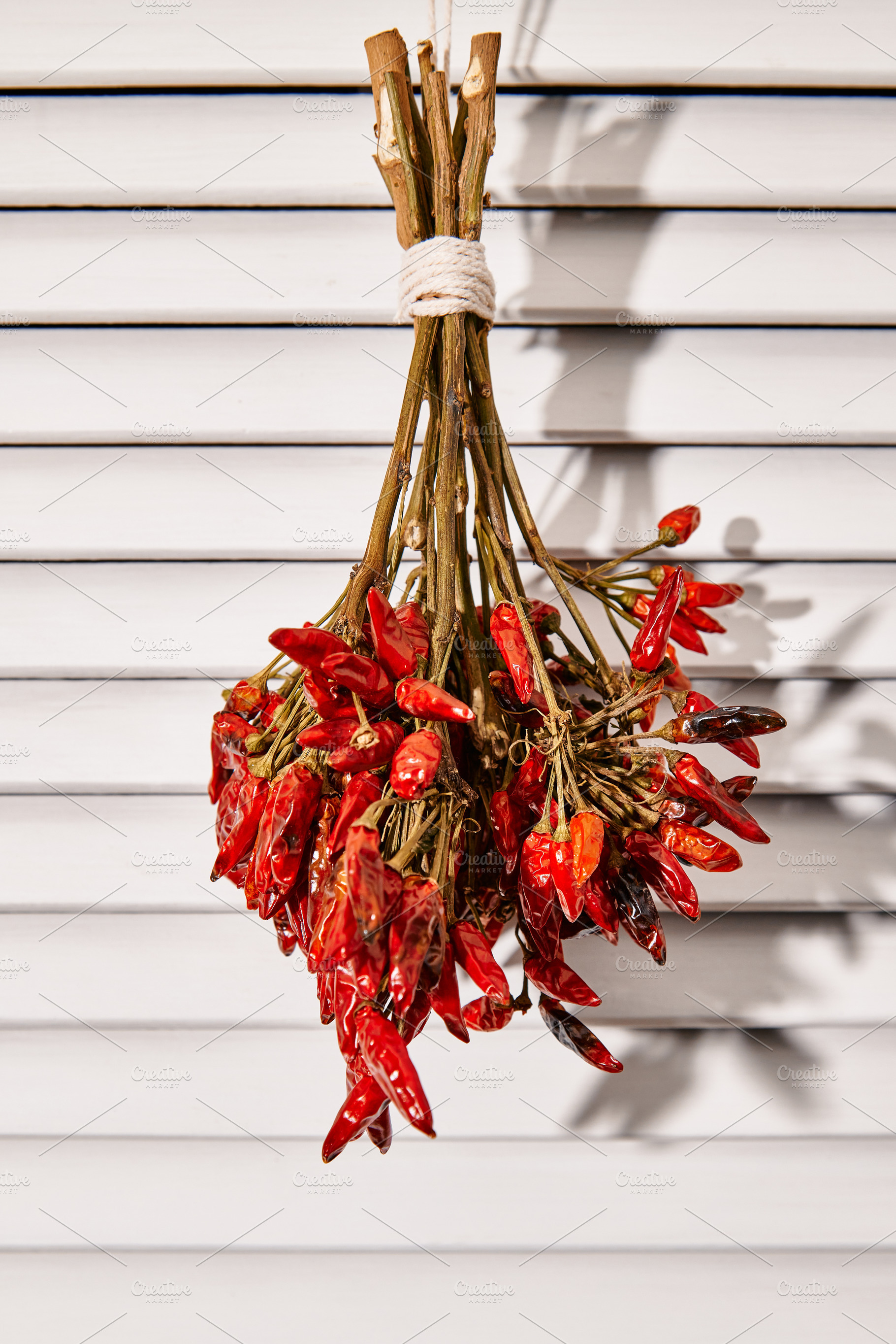 Bunch of dried chilli peppers, a Photo by Photos from the Heart