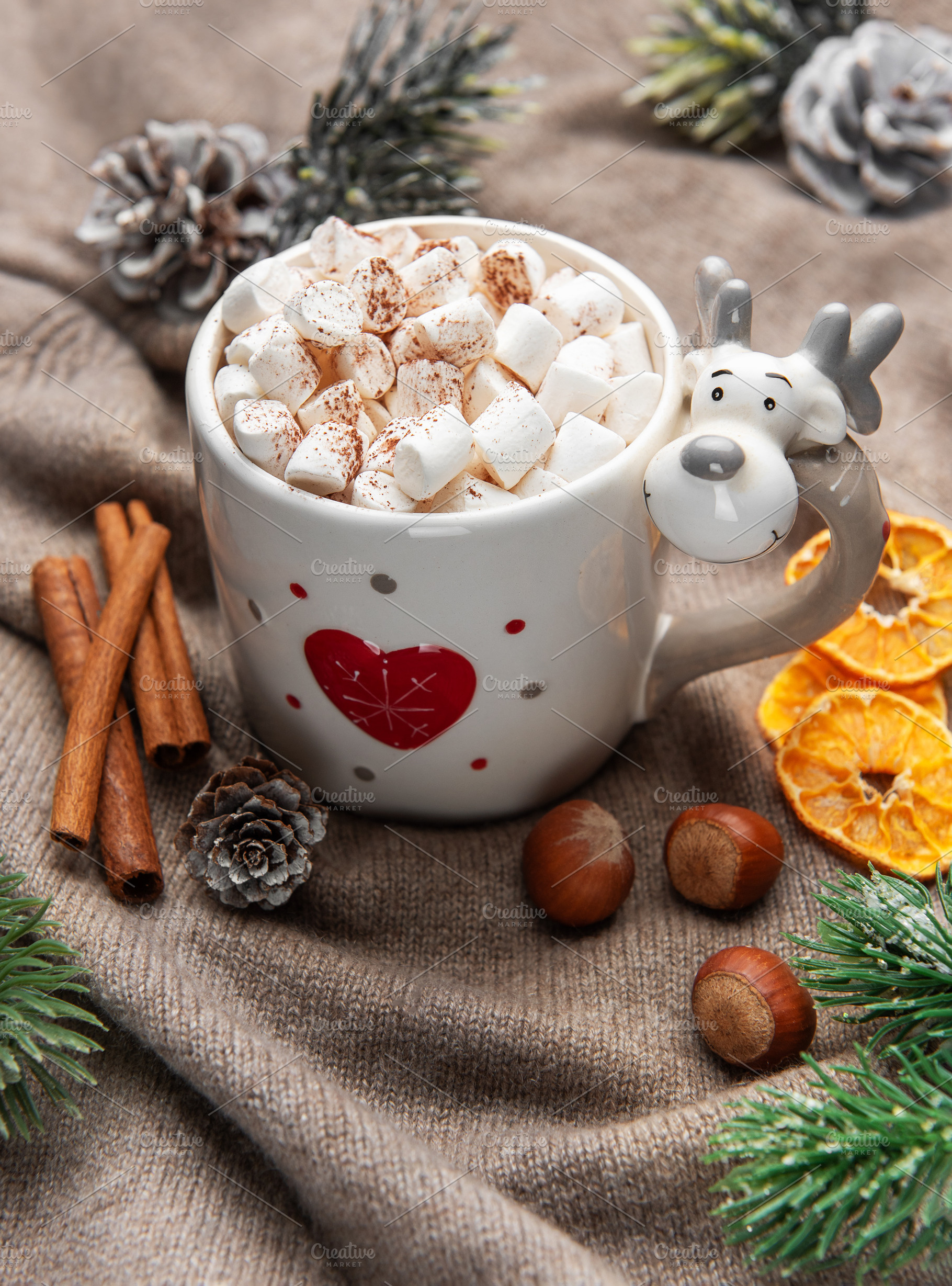 Reindeer mug filled with hot chocolate and marshmallows, a Holiday Photo by Olena Rudo