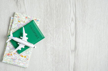 Travel planning concept containing plane, map, and passport, a Holiday Photo by photoguns