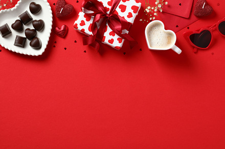 Valentine's day setting. Top view table with gift box, heart shaped candy, coff, a Holiday Photo by photoguns