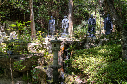 Bronze monk statues at Mitaki-Dera temple in Hiroshima, Japan, a Nature Photo by GoodGoods