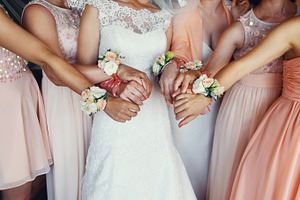 Happy bride with bridesmaids