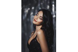 Woman in Black Dress on Festive
