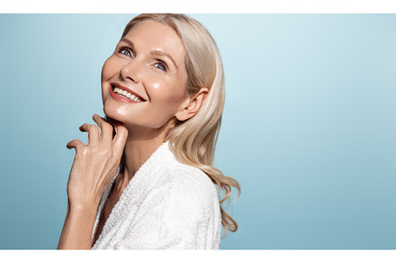 Smiling female aging model, clear