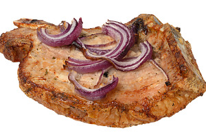 Baked pork entrecote on the bone with a golden crust, seasoned w, a Food & Drink Photo by ndanko