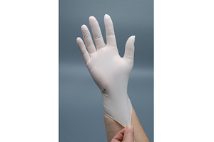 Hand putting on white nitrile, a Health & Medical Photo by Rohan Photography